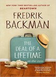 The Deal of a Lifetime by Fredrik Backman (cover) Image: a large blue suitcase sits on a wood floor and against the wall....a straw hat is propped on one corner of the suitcase and a white toy bunny lies on the floor next to the suitcase