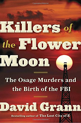 Killers of the Flower Moon by David Grann (cover) White text over a reddish and dark background