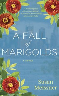 A Fall of Marigolds by Susan Neissner (cover) White test on a blue background vordered on three corners with marigolds