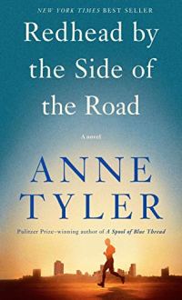 Redhead By the Side of the Road by Anne Tyler (cover) Image: a man runs on the street with a cityscape in the background
