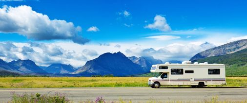 a motor home driving along a scenic highway